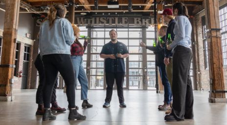 A group of people at the Steam Whistle Brewing tour