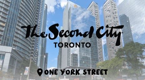The Second City Toronto logo over buildings in the city