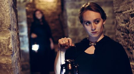 Girl holding a lantern